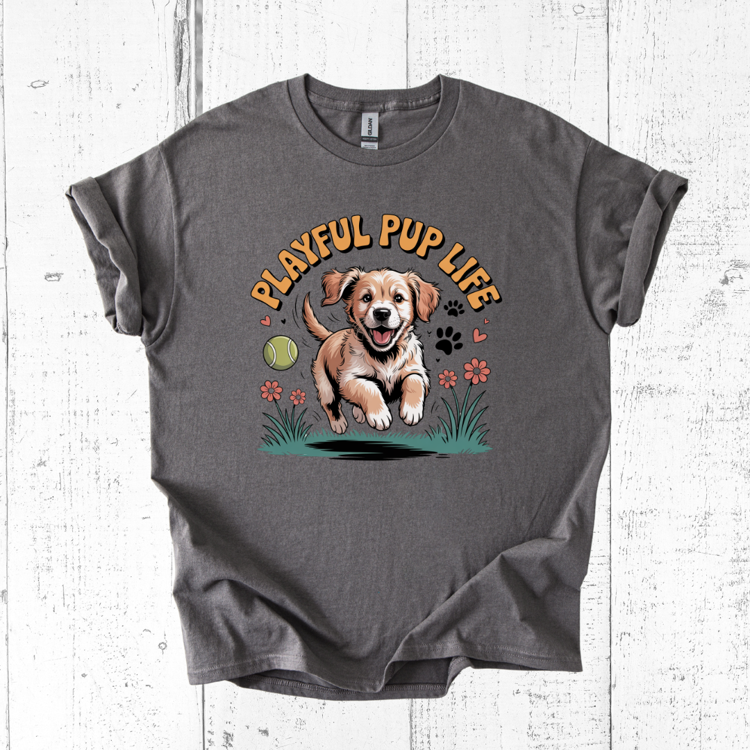 Gray t-shirt with a graphic of a dog and 'Playful Pup Life' text on a wooden surface