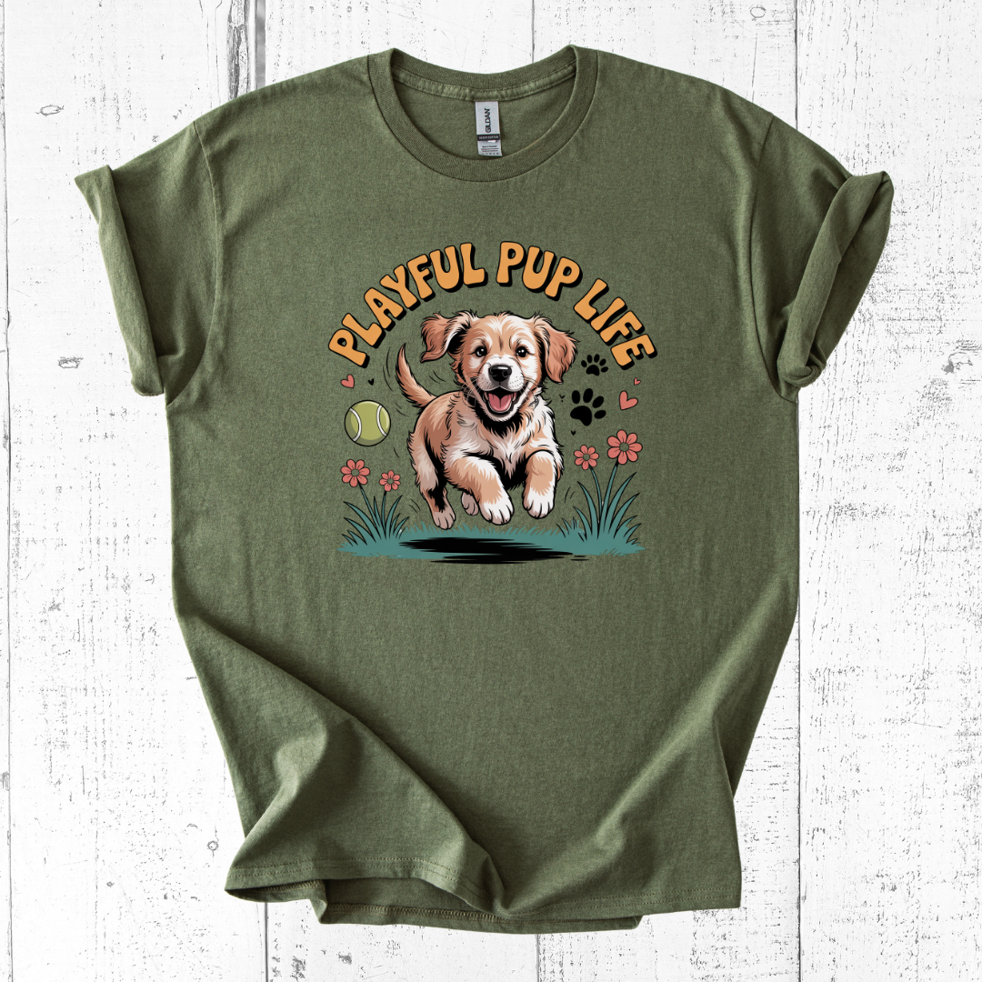 Green t-shirt with a dog graphic and 'Playful Pup Life' text on a white wooden surface