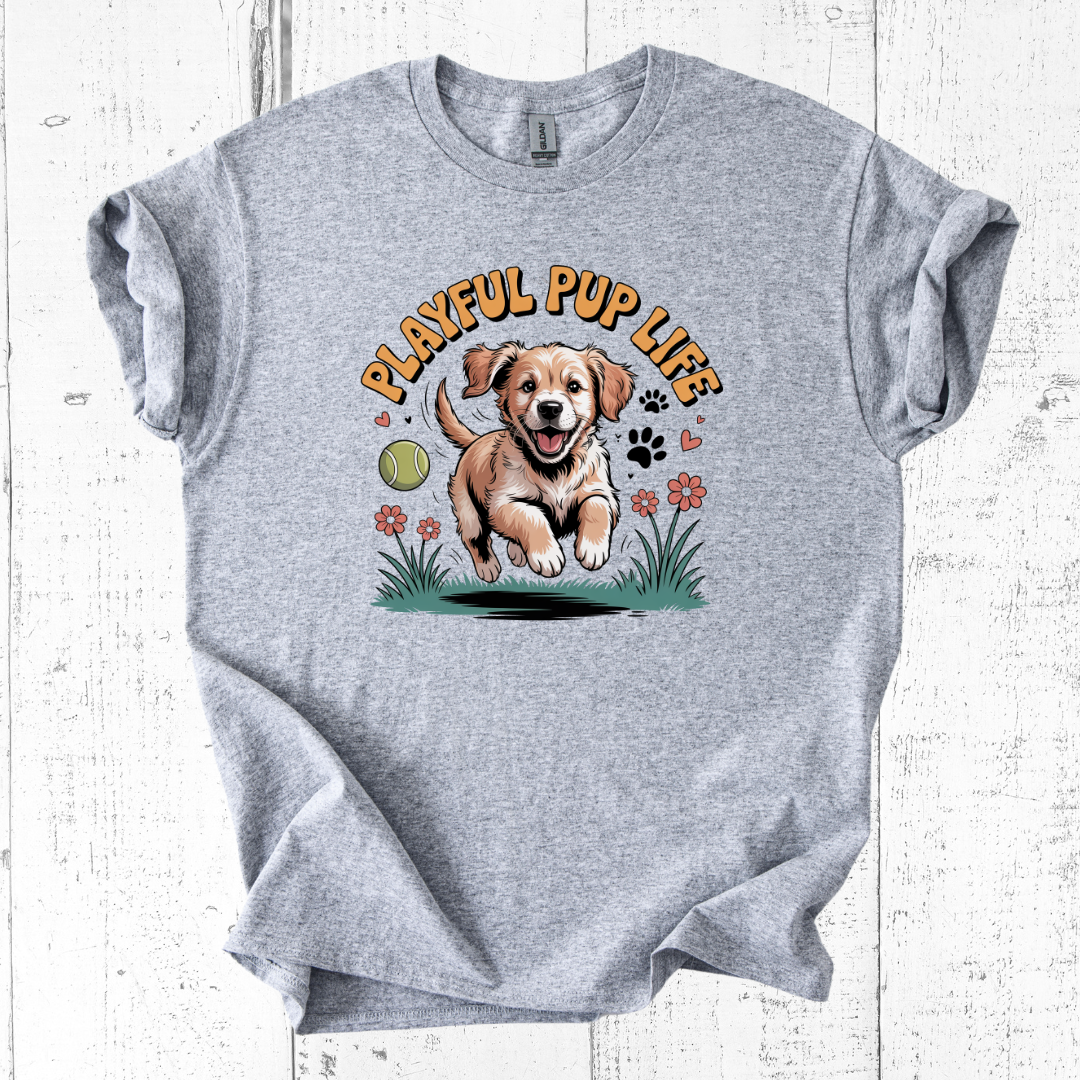 Gray t-shirt with a graphic of a puppy and 'Playful Pup Life' text on a white wooden background