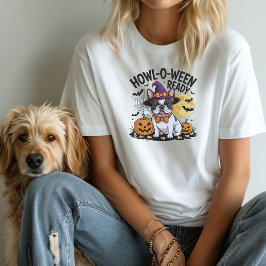 Person wearing a 'Howl-o-ween Ready' t-shirt with a dog sitting next to them.