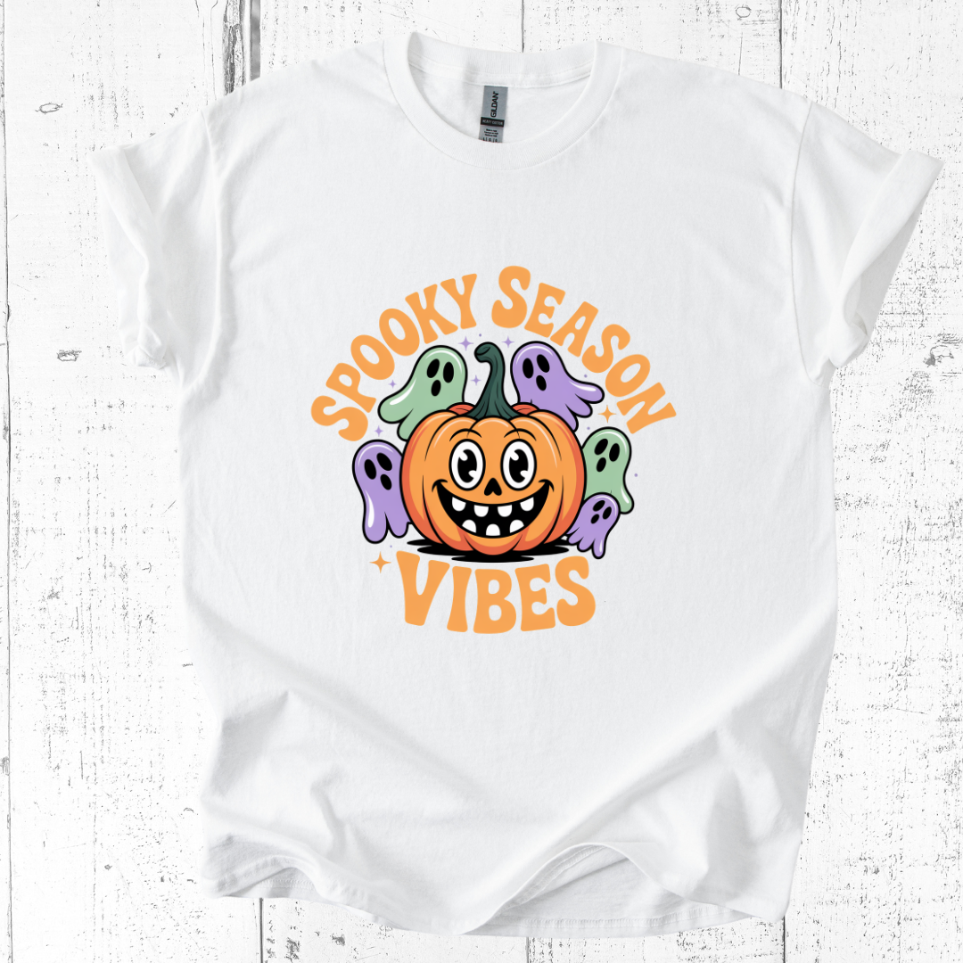 White t-shirt with Halloween-themed design featuring a pumpkin and ghosts on a white background