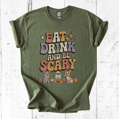 Green t-shirt with Halloween-themed text and graphics on a white wooden background