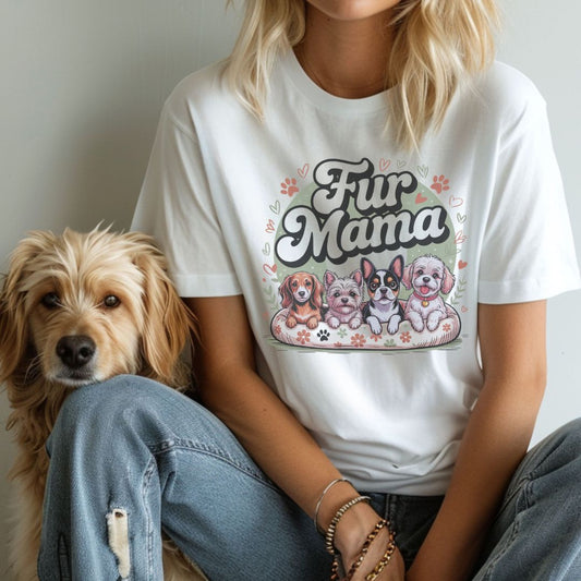 Person wearing a 'Fur Mama' t-shirt with dog illustrations, sitting next to a dog.