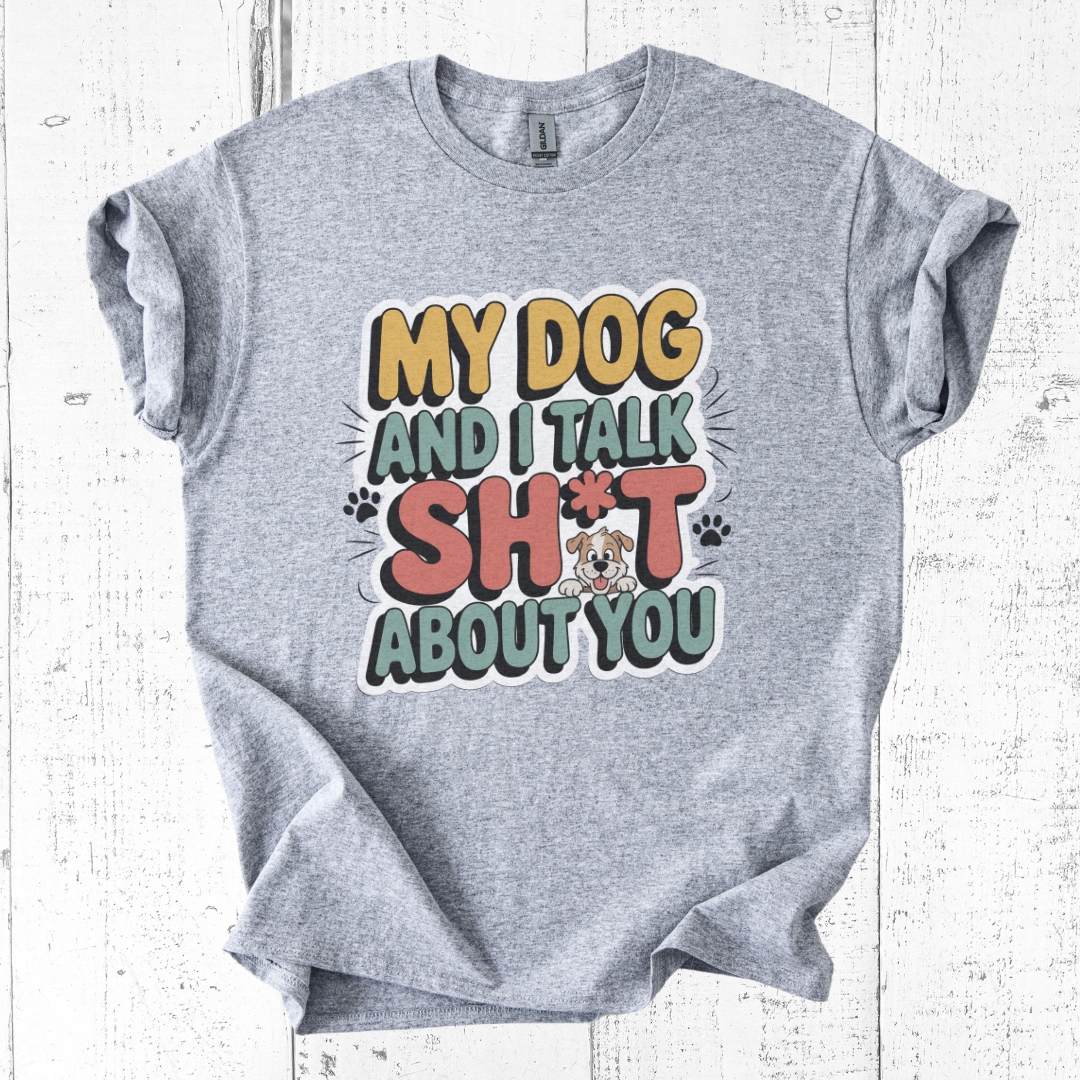 Gray t-shirt with humorous graphic and text on a white wooden background
