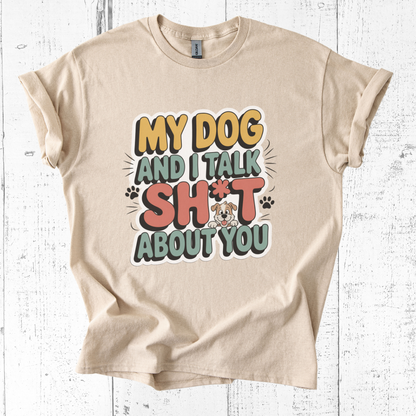 Beige t-shirt with humorous text design on a white wooden background