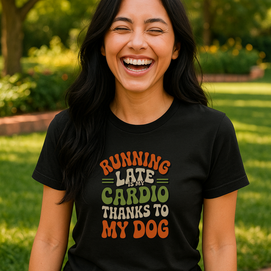 Woman wearing a black t-shirt with colorful text in an outdoor setting