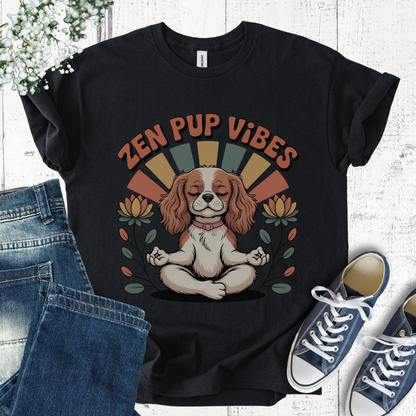 Black t-shirt with 'Zen Pup Vibes' design featuring a dog in a meditative pose, placed on a white surface with jeans and sneakers.