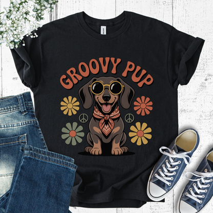 Black t-shirt with 'Groovy Pup' design featuring a dachshund, flowers, and peace signs on a white background.