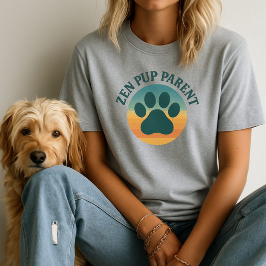 Person wearing a 'Zen Pup Parent' t-shirt with a dog sitting next to them.