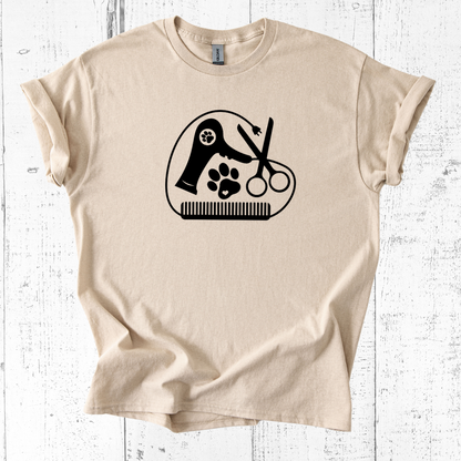 Beige t-shirt with a black graphic design on a white wooden background