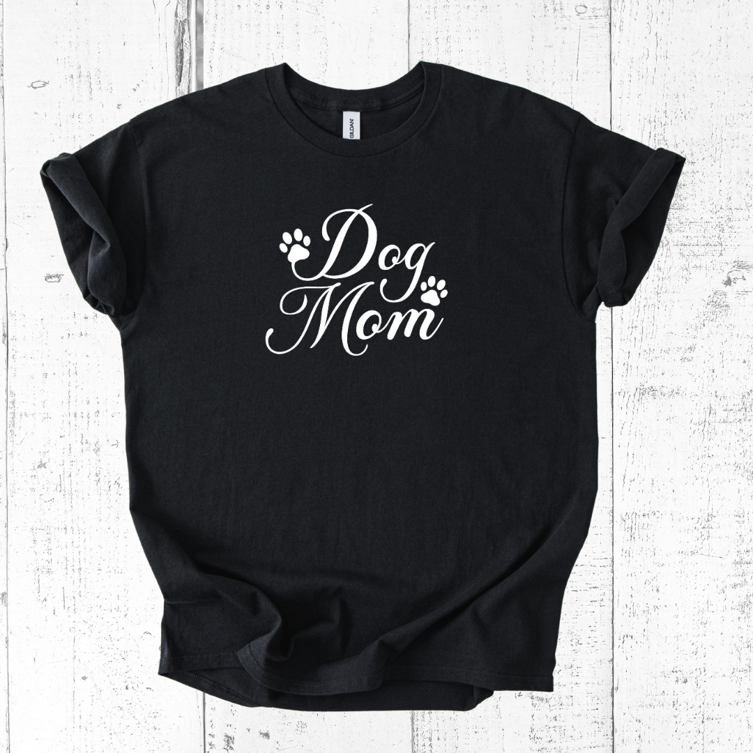 Black t-shirt with 'Dog Mom' text on a white wooden background