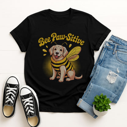 Black Gildan 6400 unisex t-shirt with retro dog graphic and ‘Bee Paw-Sitive’ text, perfect for dog lovers.