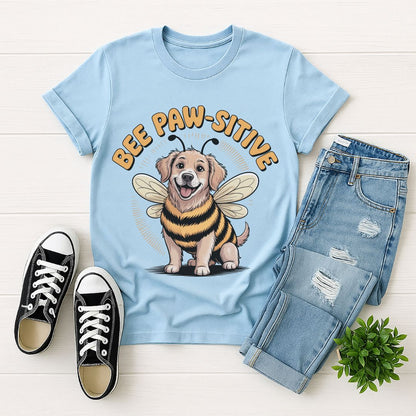 Light Blue Gildan 6400 unisex t-shirt with retro dog graphic and ‘Bee Paw-sitive’ text, perfect for dog lovers.
