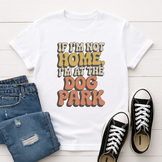 White Gildan 6400 unisex t-shirt with retro dog graphic and ‘If I'm Not Home, I'm At The Dog Park’ text, perfect for dog lovers.