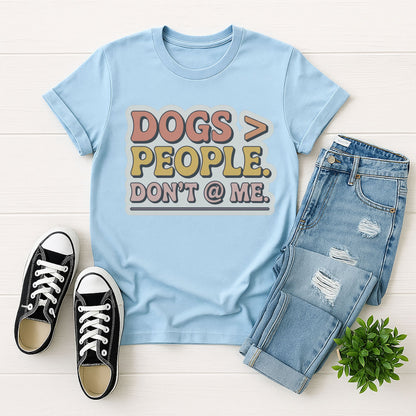 Light Blue Gildan 6400 unisex t-shirt with retro dog graphic and ‘Dogs > People. Don't @ Me’ text, perfect for dog lovers.