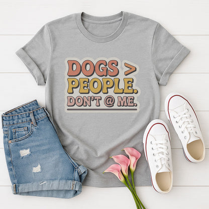 Sport Gray Gildan 6400 unisex t-shirt with retro dog graphic and ‘Dogs > People. Don't @ Me’ text, perfect for dog lovers.