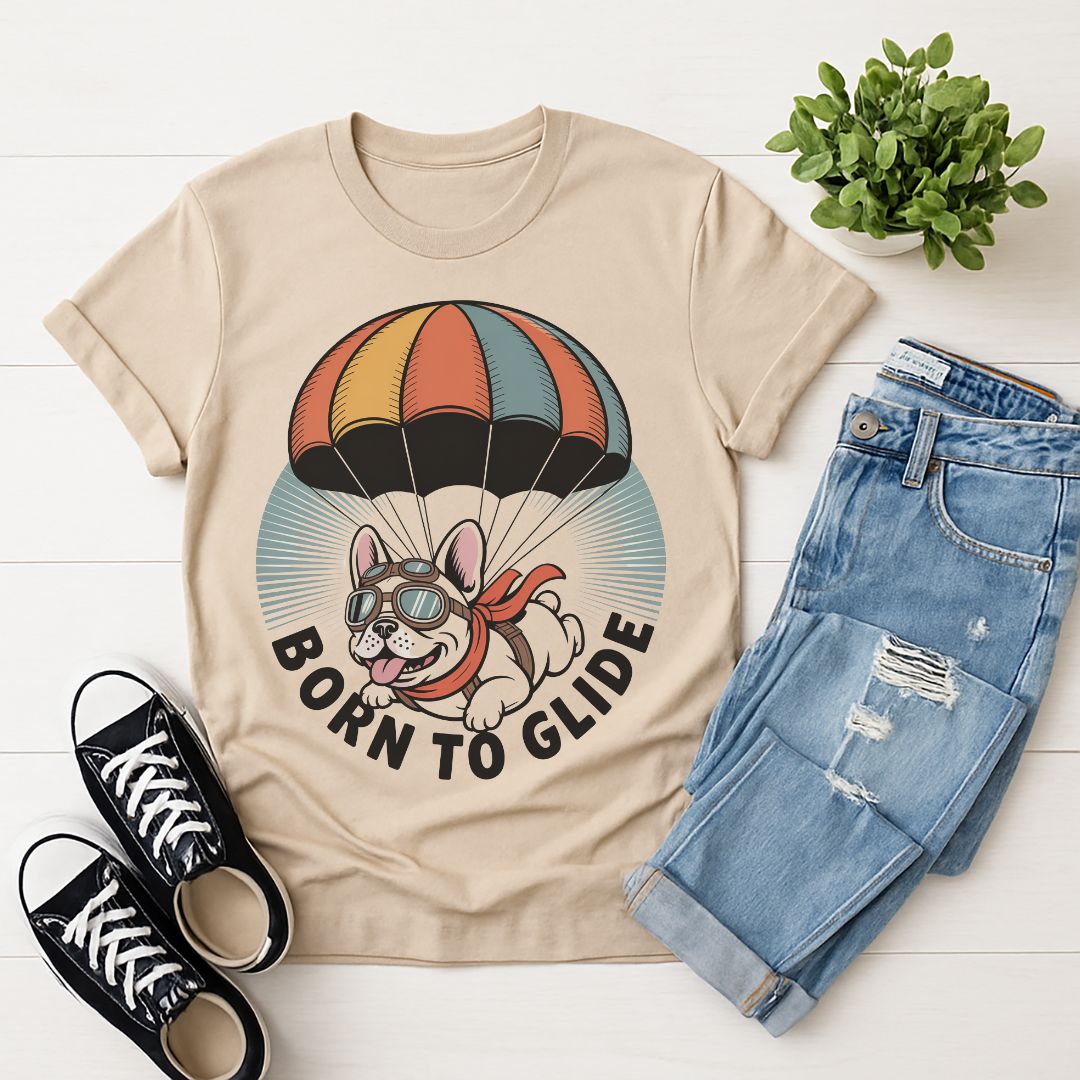 Sand Beige Gildan 6400 unisex t-shirt with retro dog graphic and ‘Born To Glide.’ text, perfect for dog lovers.