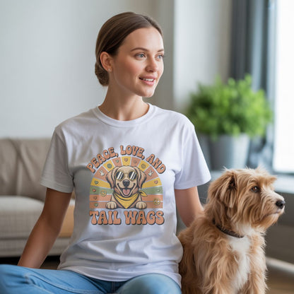 Unisex t-shirt with retro dog graphic and ‘Peace, Love And Tail Wags’ text, perfect for dog lovers.
