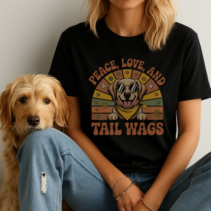 Black unisex t-shirt with retro dog graphic and ‘Peace, Love And Tail Wags’ text, perfect for dog lovers.