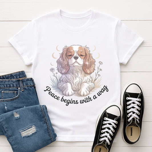 White Gildan 6400 unisex t-shirt with retro dog graphic and ‘Peace begins with a wag’ text, perfect for dog lovers.