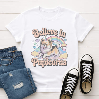 White Gildan 6400 unisex t-shirt with retro dog graphic and ‘Believe in Pupicorns’ text, perfect for dog lovers.