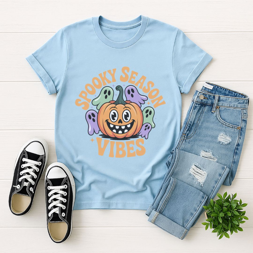 Light blue Gildan 6400 unisex t-shirt with retro dog graphic and ‘Spooky Season Vibes.’ text, perfect for dog lovers.