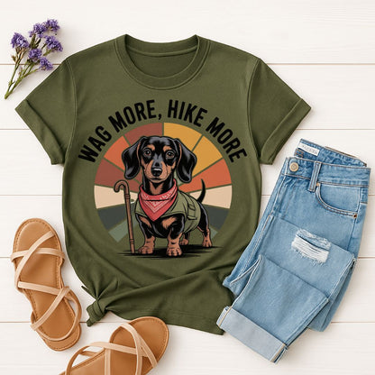 Military Green Gildan 6400 unisex t-shirt with retro dog graphic and ‘Wag More, Hike More.’ text, perfect for dog lovers.