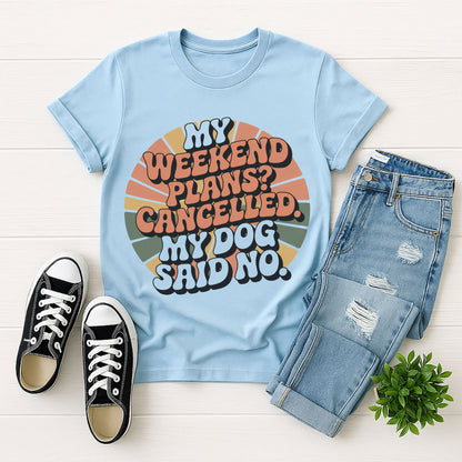 Light Blue Gildan 6400 unisex t-shirt with retro dog graphic and ‘My Weekend Plans? Cancelled. My Dog Said No’ text, perfect for dog lovers.