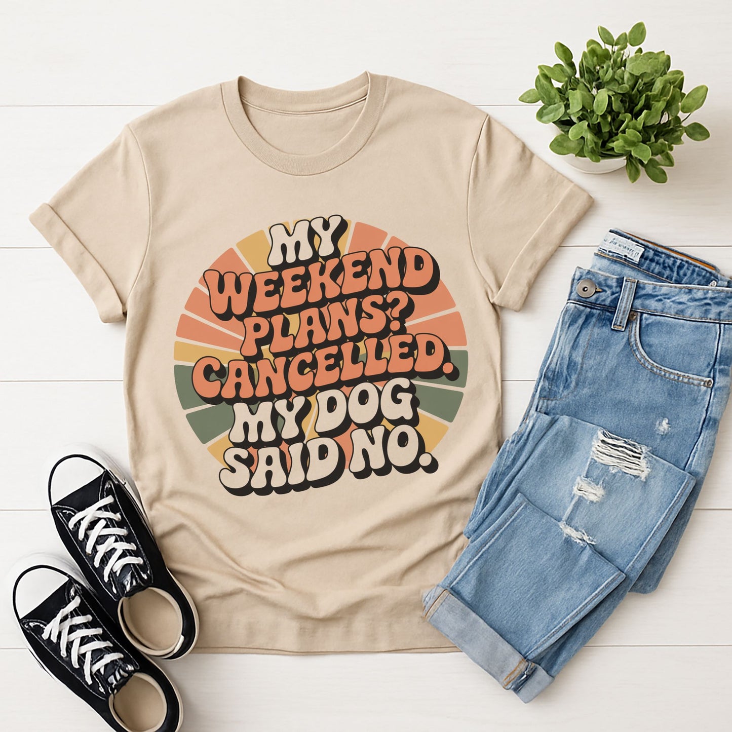 Sand Beige Gildan 6400 unisex t-shirt with retro dog graphic and ‘My Weekend Plans? Cancelled. My Dog Said No’ text, perfect for dog lovers.